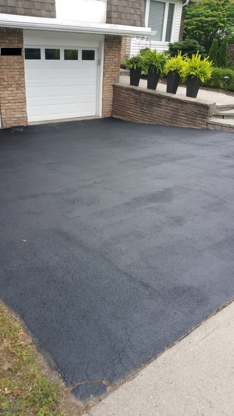 Do-it-yourselfers rejoice! The cheapest driveway material is here and it is Liquid Rubber Driveway Restore! Here's how you use it to resurface your asphalt driveway.