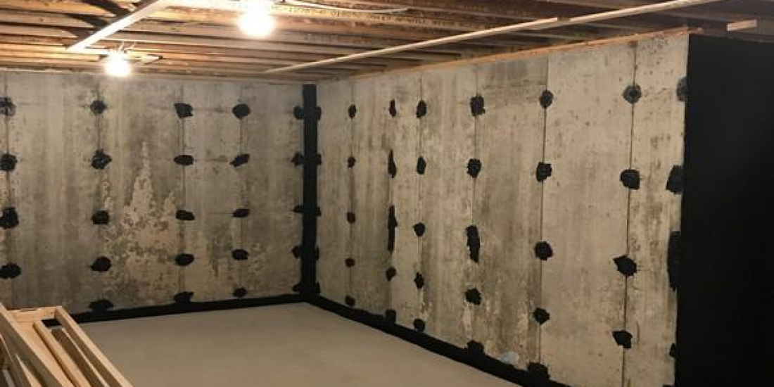 Concrete interior basement walls coated in waterproof sealant